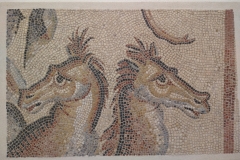 Mosaic depicting horses, a fragment from a larger mosaic depicting Neptune. From a residence found in Autun. Dated to the 2nd-3rd century CE. Musée Rolin.