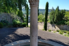 Column with ancient capital along Route de la Province.