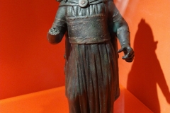 Bronze figure of an actor inscribed with the name DOVECUS. A hinge on the head indicates there was probably a mask that could be brought down over the actors face. Dated to the early 3rd century CE. Musée Romain.