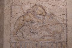 Mosaic of a lion attacking an animal, from the larger Hercules and Antaeus mosaic. Musée Romain.