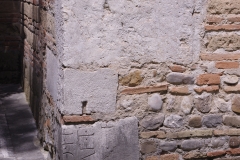 Spolia in the rear external wall of the Chiesa di Santa Sofia.