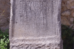 Inscription from the courtyard of the Soprintendenza Archeologia which  honors one the duumvir Lucius Pupius, son of Quintus, for the construction of a road on behalf of the games with his own money. Found in the Cellarulo area.