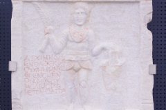 Funerary stele of the gladiator Archimedes who declares he did not exist and was born, he died and does not exist, and he does not care. Dated to the late 2nd century CE. Wall of Memory at the Archaeological Museum of Veria.