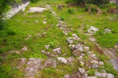 Baths or odeon along Megalos Alexandros .