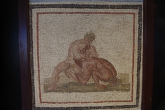 Mosaic of wrestlers, from Tunisia. Displayed in the Museo Archeologico Nazionale di Cagliari.