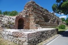 Tower with preserved/reconstructed entrance in the eastern walls.