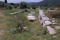 Road leading south between the Greek baths and Heroon.