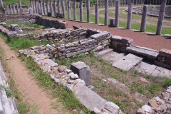 Rooms XI and IX (Tiberius Claudius Theon base) along the western area of the gymnasium.