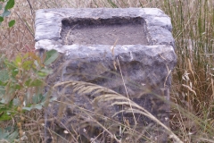 Base with shallow cavity on the terrace of the Kouretes.