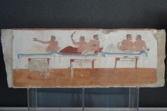 Symposium scene with men playing kottabos, from the Tomb of the Diver.