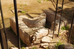 Detail of a decorated basin in the peristyle of the Roman villa at Villa Bonanno.