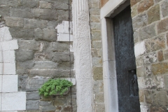 Column from the propylaeum in the southern facade of the bell tower.