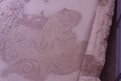 Mosaic flooring exposed in the northern side aisle of the nave of the Basilica della Santissima Trinità in Venosa.